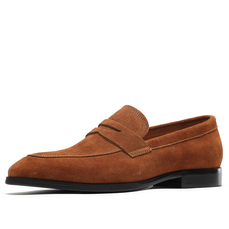 Brown suede loafer shoe on a white background